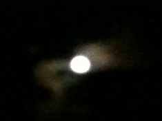 first photo of full moon in cloud