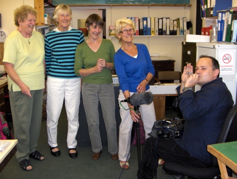 Kay's photo of Stuart playing the bo'sun's whistle, with the assistance of staff at Teignmouth and Shaldon Museum